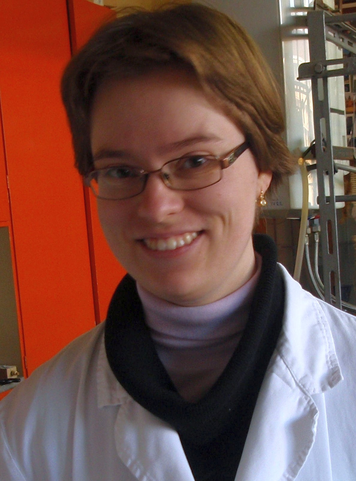 Dr. Marina Sekutor in her lab coat