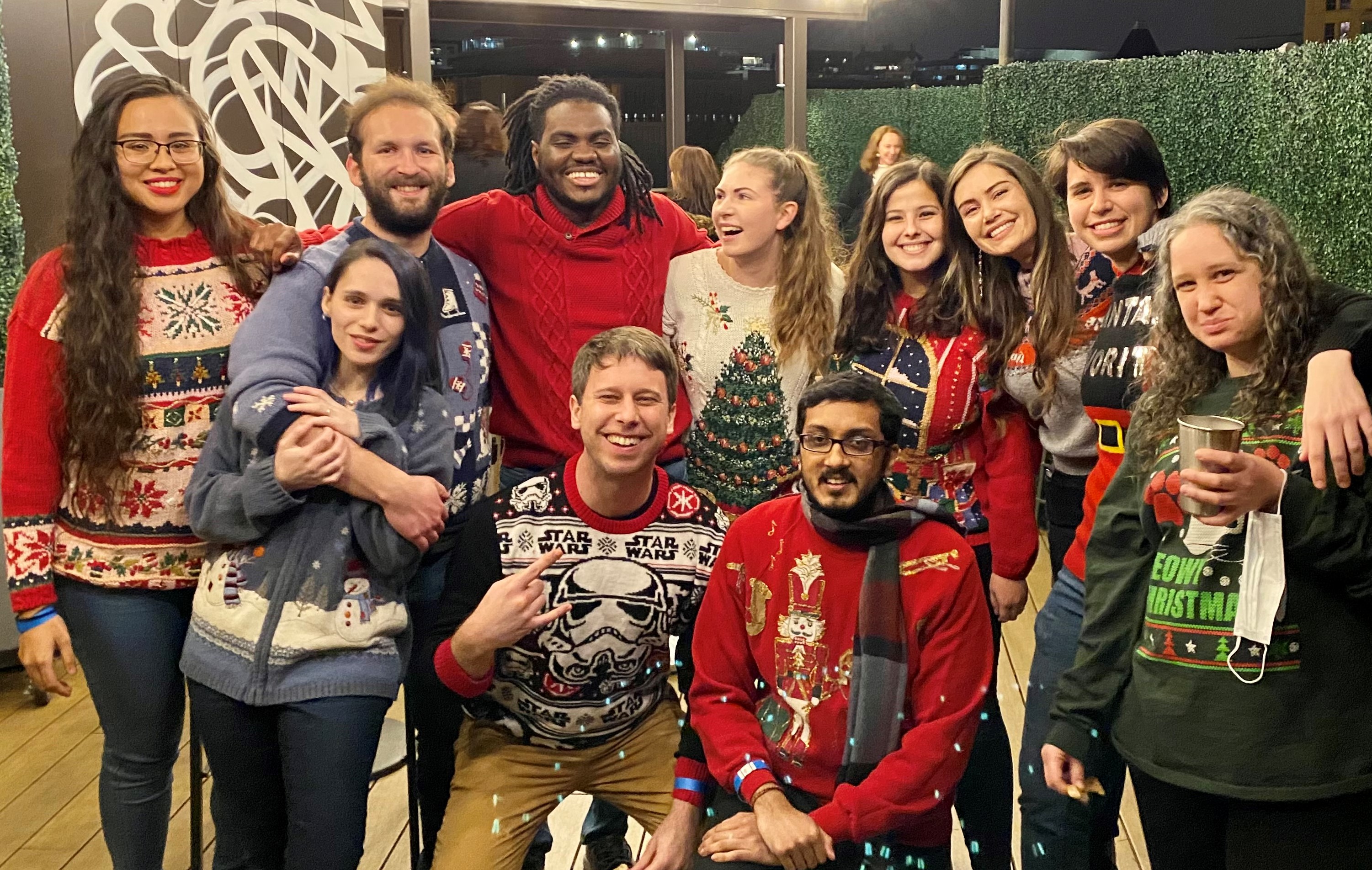 Graduate Students at our annual holiday party in their traditional ugly holiday sweaters