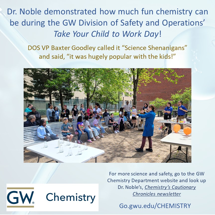 Dr. Noble demonstrating experiments for take your child to work day
