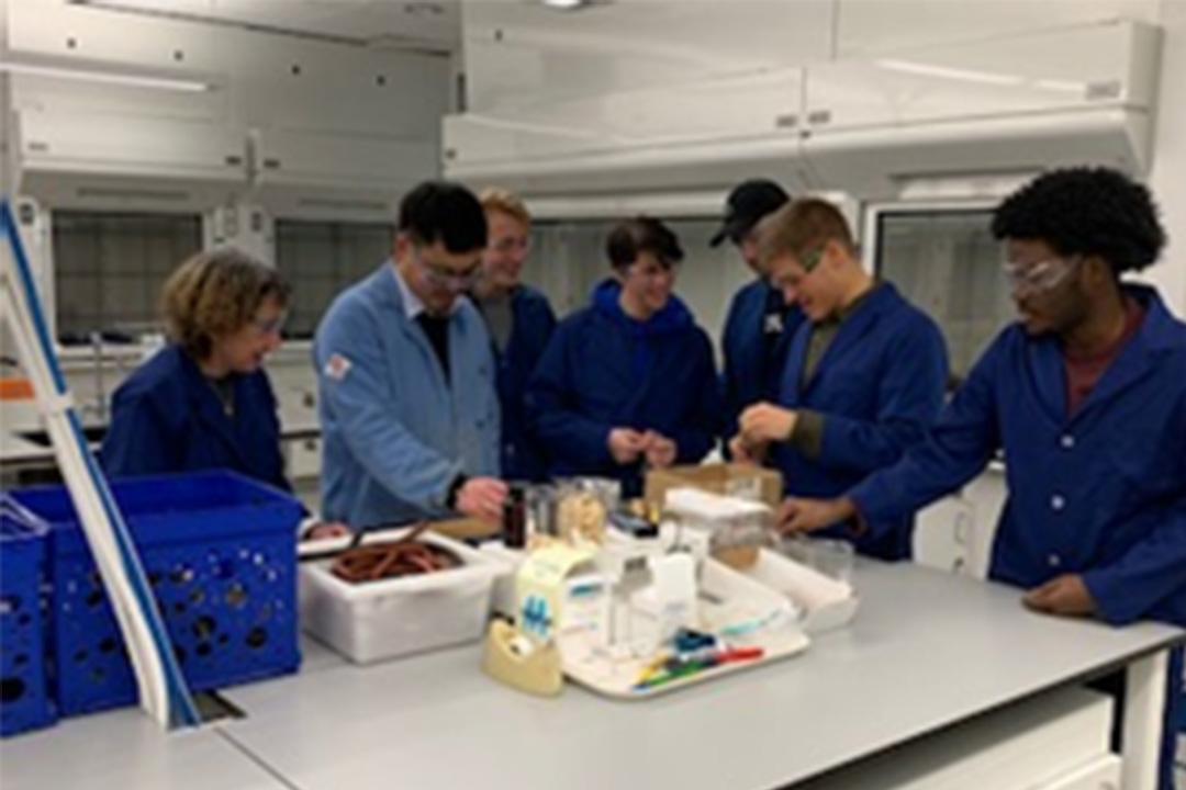 Left to right, Dr. Clements surrounded by Chenyang Ma, Logan Bartholomew, Dominique Brager, Kenny Heidel, Rhys Dickhudt, and Christopher Hossack