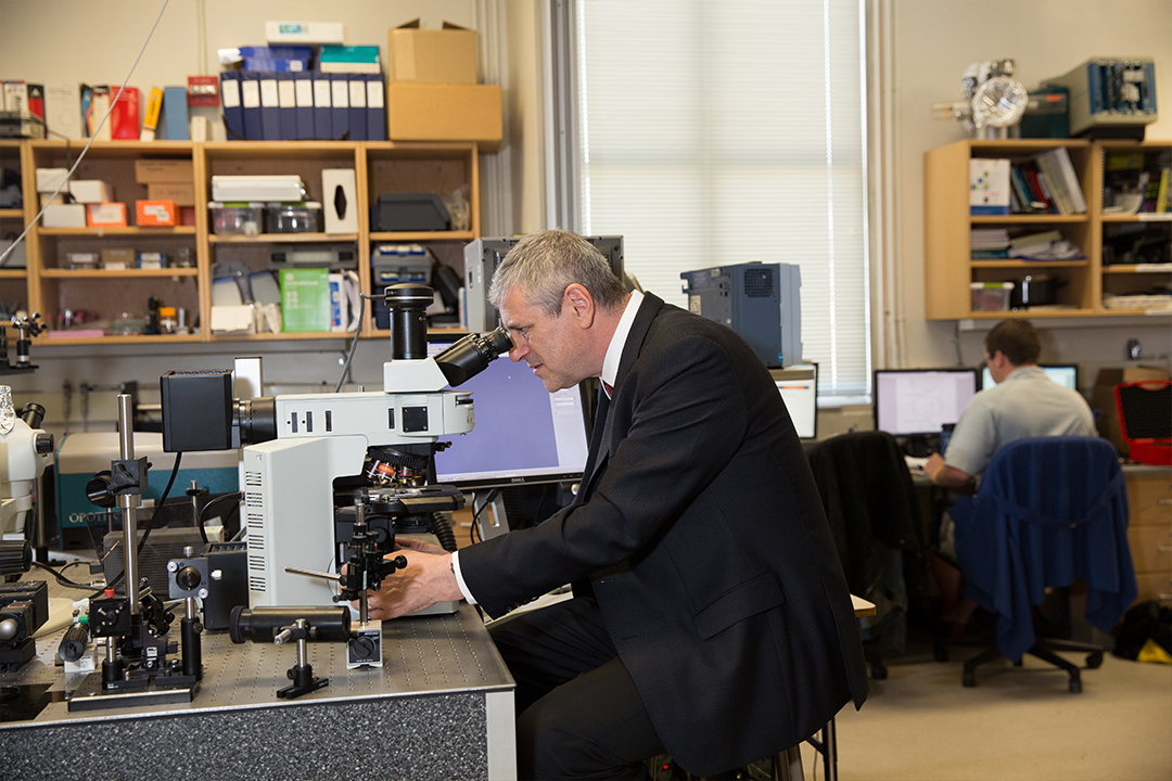 Professor of Chemistry Akos Vertes in a lab