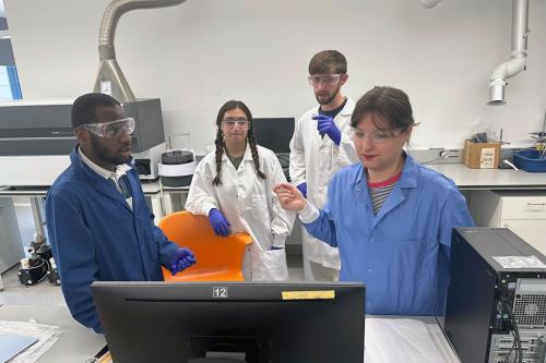 Jordan Tanen in the Analytical Chemistry Lab with undergraduates (from left) Issa Samba, Isabelle Frazier and Jonathan Kurtz
