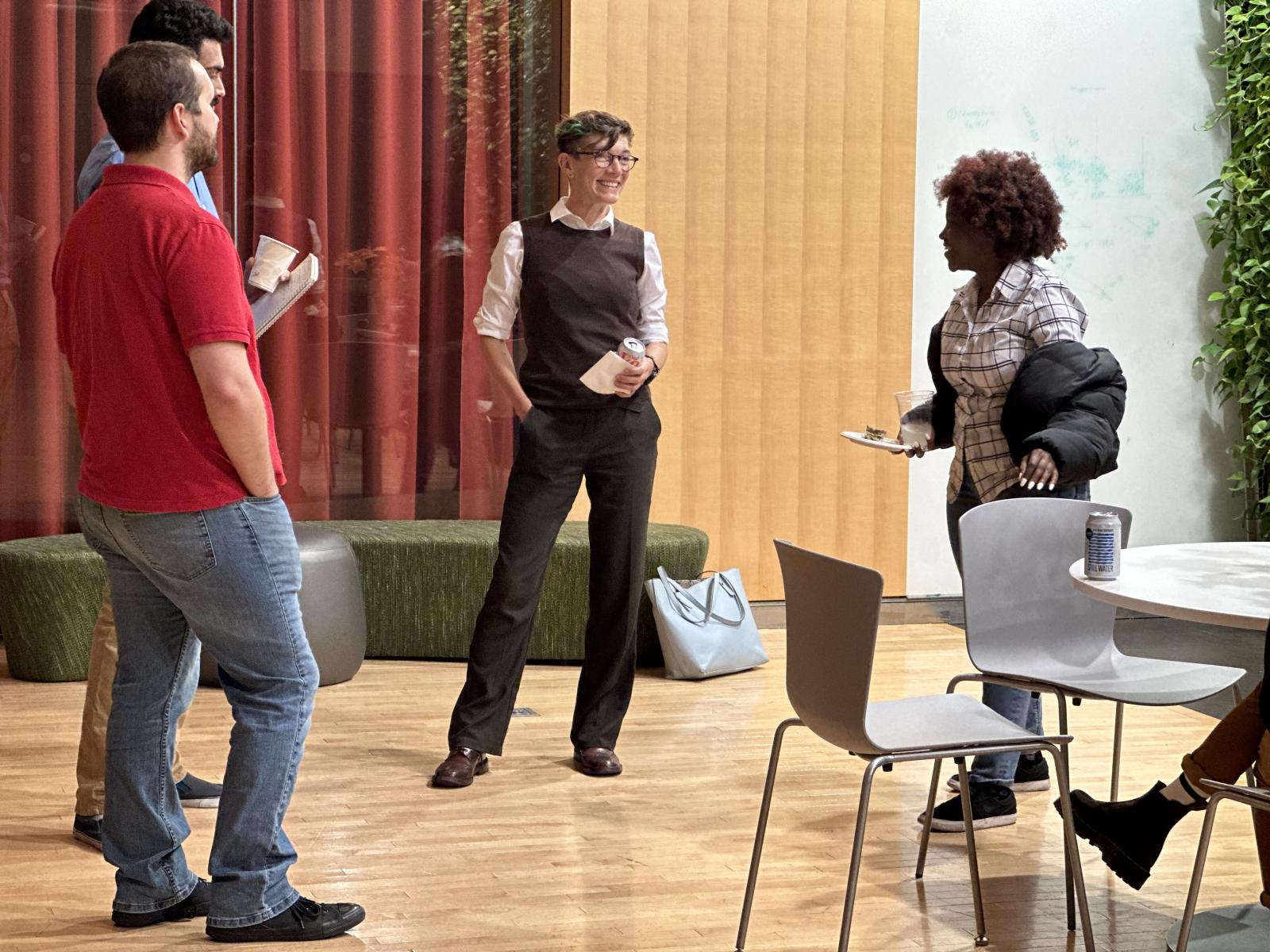 Graduate students get an opportunity for casual conversation with our Caress Speaker, Dr. Polly Arnold