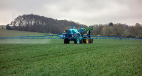 Pesticides being sprayed on a field